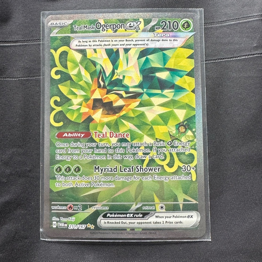 Teal Mask Ogerpon ex Pokemon 211/167
Illustration Rare Twilight Masquerade (TWM)